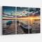 Designart - Boats and Jetty under Dramatic Sky - Modern Canvas Art Print